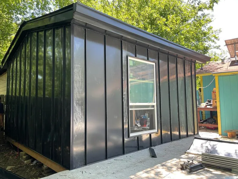 Black standing seam metal wall panels for Metal Roof Installation in South Burlington