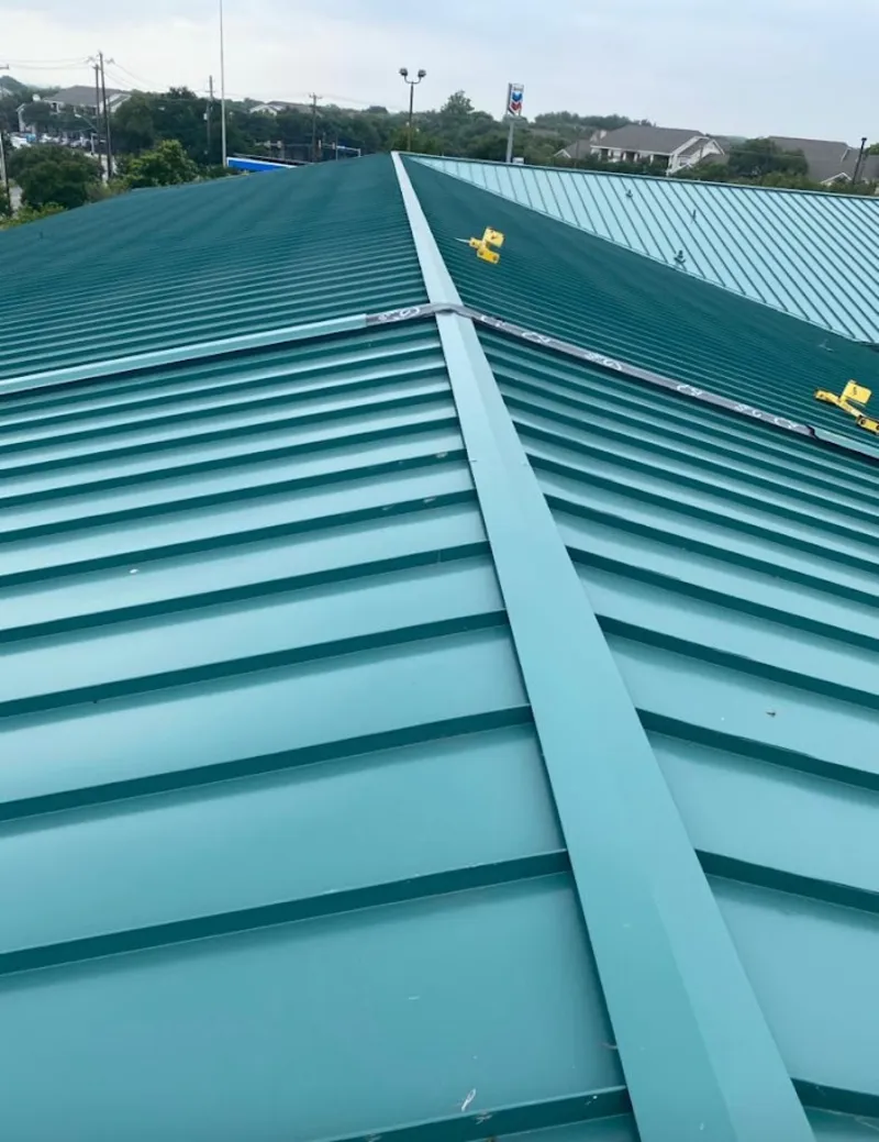 Green commercial metal roof ridge and valley for Metal Roof Repair in South Burlington